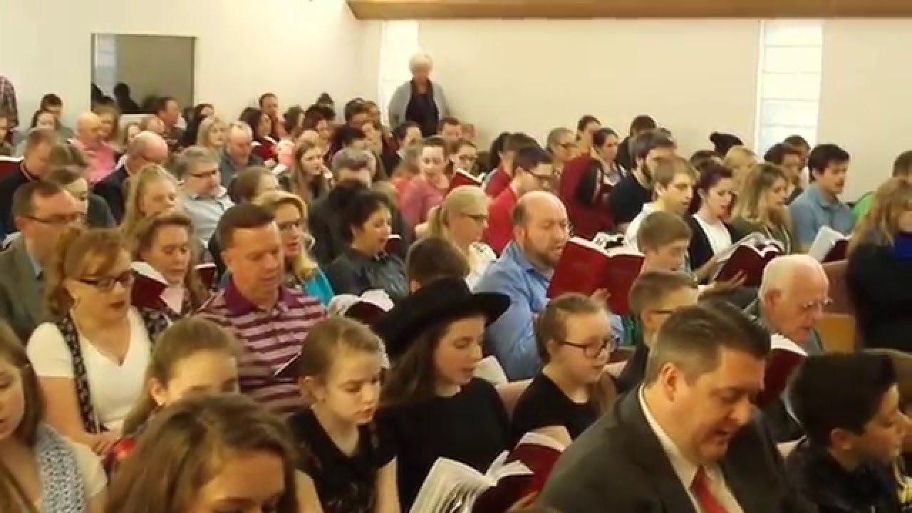 People Singing in Church