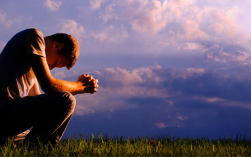 Kneeling in prayer