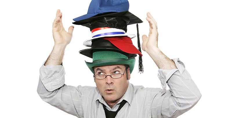 Man wearing many hats