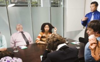 People in a boring meeting