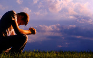Kneeling in prayer
