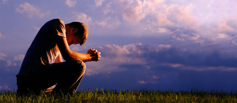 Kneeling in prayer