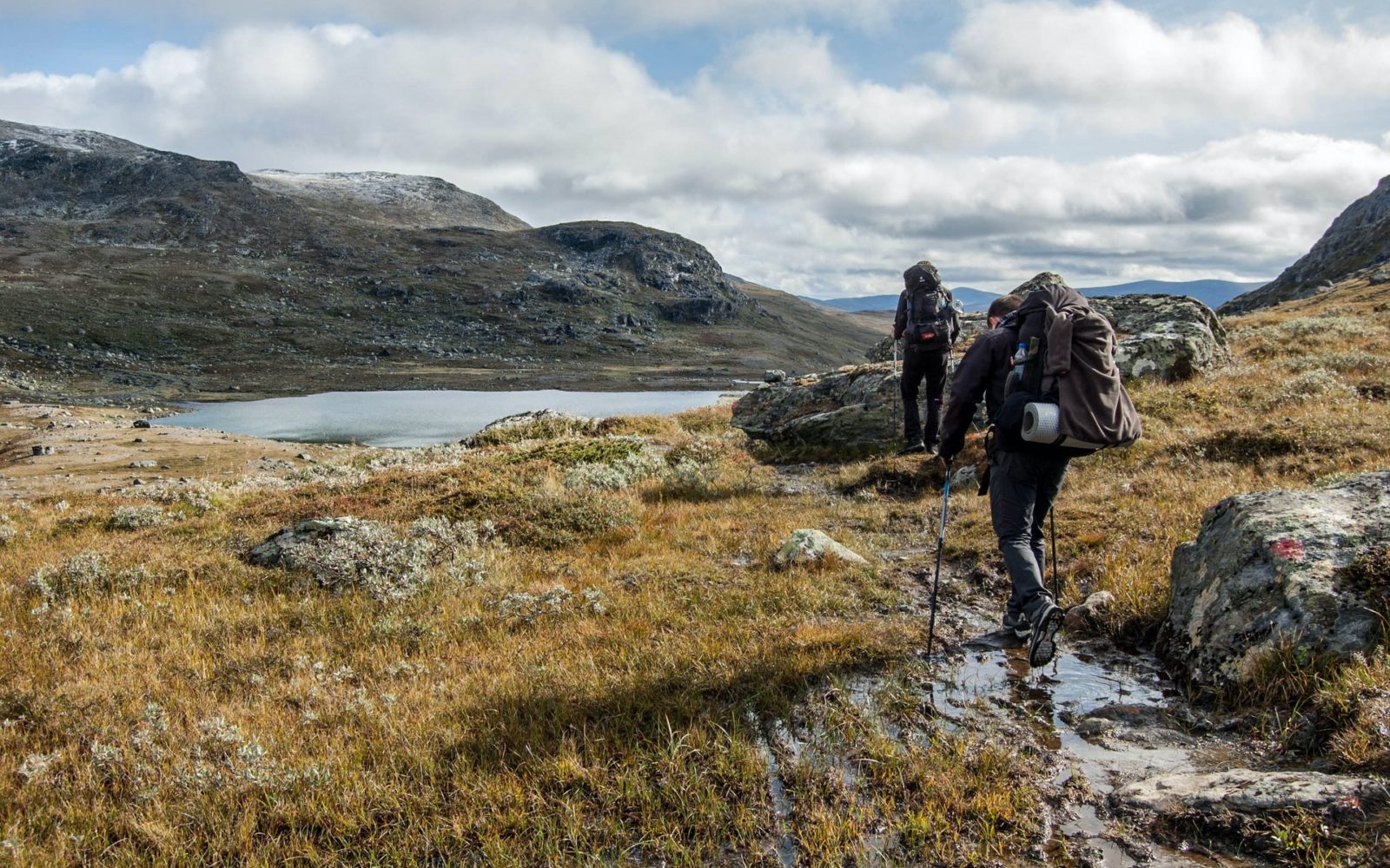 Two men on mountain trail