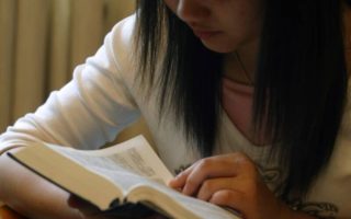 Woman reading bible